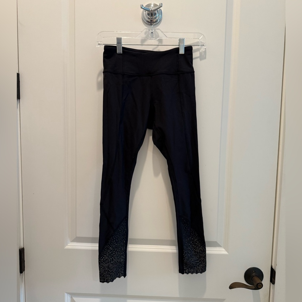 Lululemon black leggings size 4 in like new condition